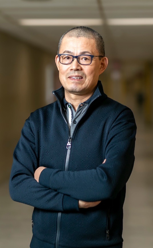 Qi He