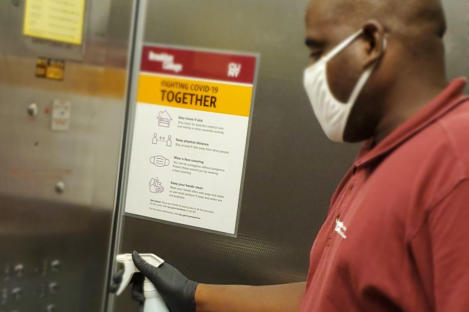 Office of Facilities team member Christopher sanitizes elevator buttons multiple times a day.