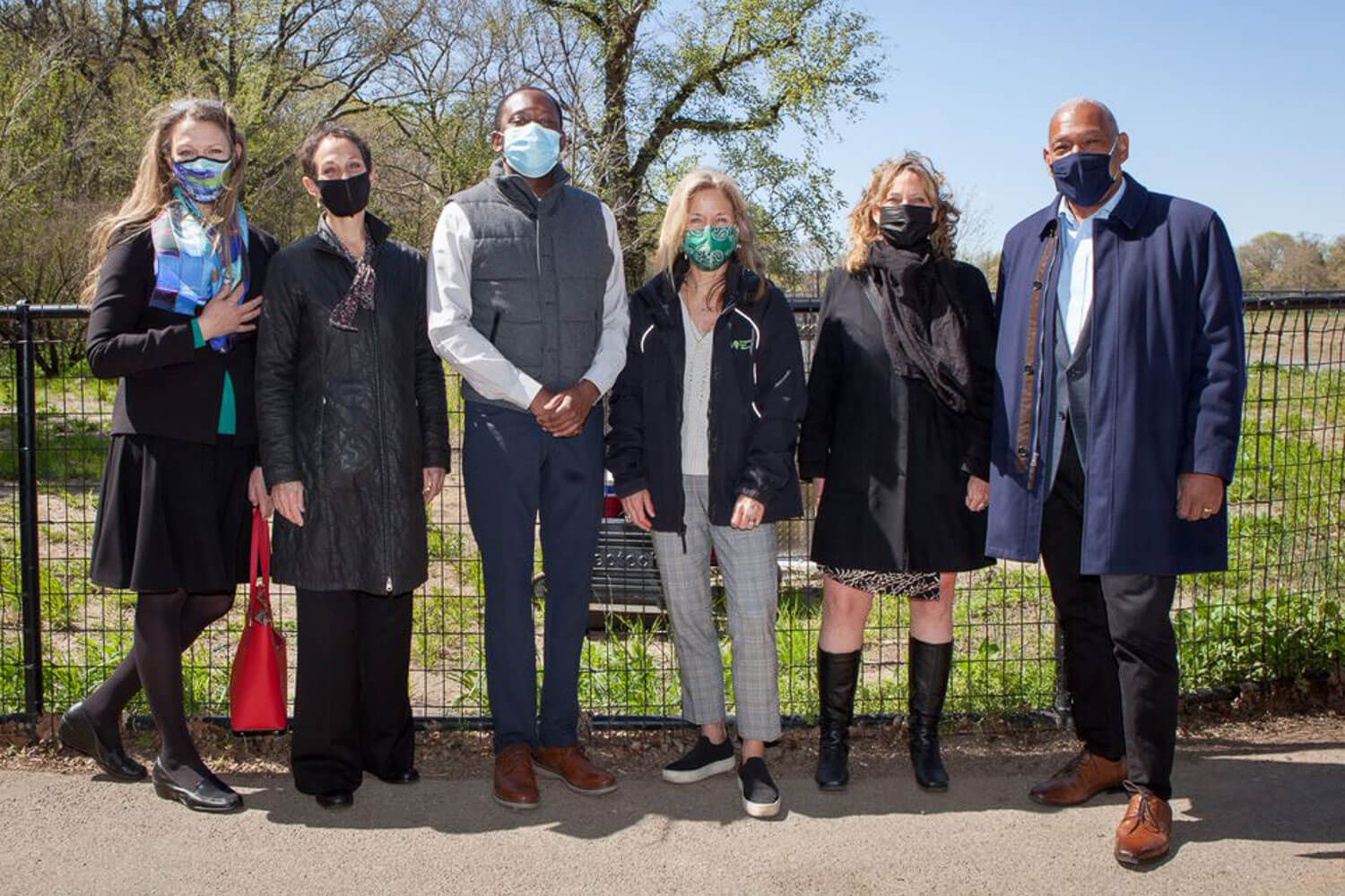 (L-R) Brooklyn College President Michelle J. Anderson; Leslie Wright, New York City Regional Director, New York State Parks; Dante Arwine, District Manager, Community Board 9; Sue Donoghue, President, Prospect Park Alliance; Jennifer Cherrier, ecoWEIR inventor and Brooklyn College professor and chair of the Department of Earth and Environmental Sciences; and Mitchell J. Silver, New York City Parks Commissioner, stand in front of the site of one ecoWEIR system near Dog Beach at Prospect Park during its public unveiling on April 23.