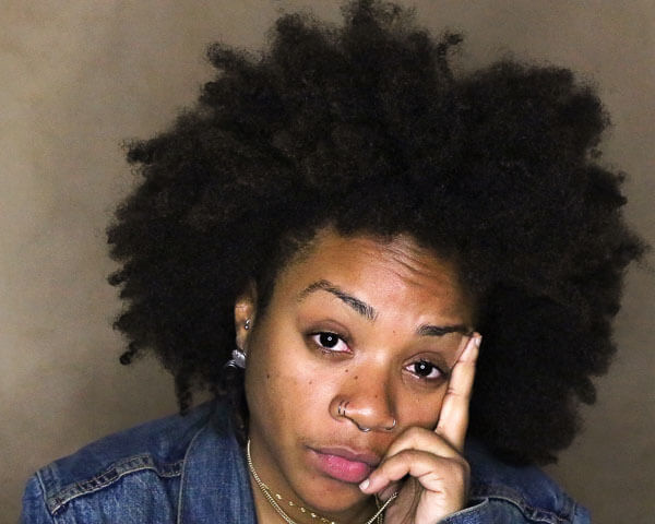 Liselle Ferdinand '21, a Reading Rescue coach and new alumna of the Early Childhood Education master's degree program.